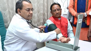 Chief Minister gives message of health awareness by checking his BP sugar at health camp.