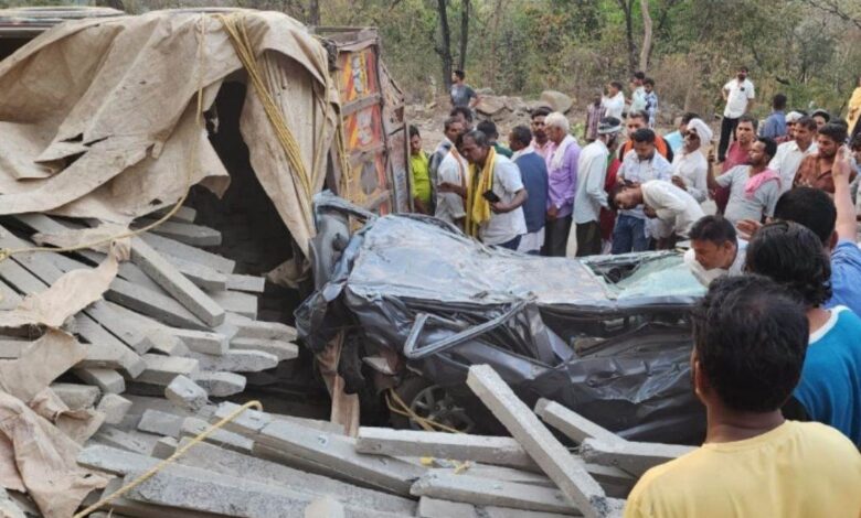 Truck loaded with cement pole overturns in car, 4 killed. 