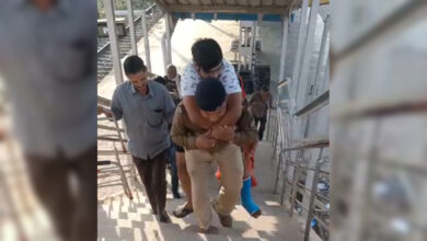 RPF jawan climbs ladder carrying passenger on shoulder, video goes viral on social media.