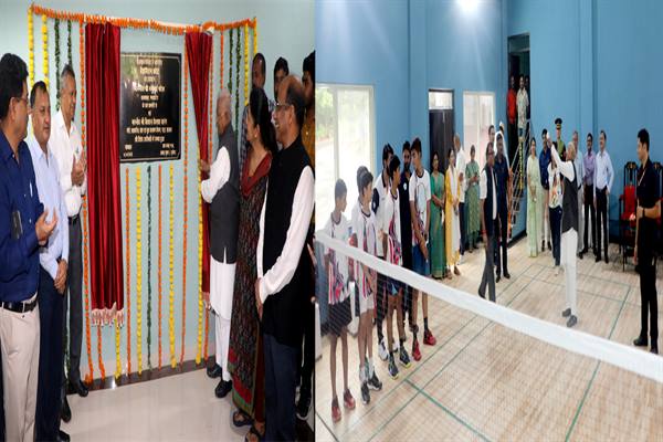 Governor Patel inaugurates newly constructed court by playing badminton.